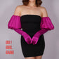 Black strapless dress with pink gloves and text 'OH! GIRL GANG' on a gray background