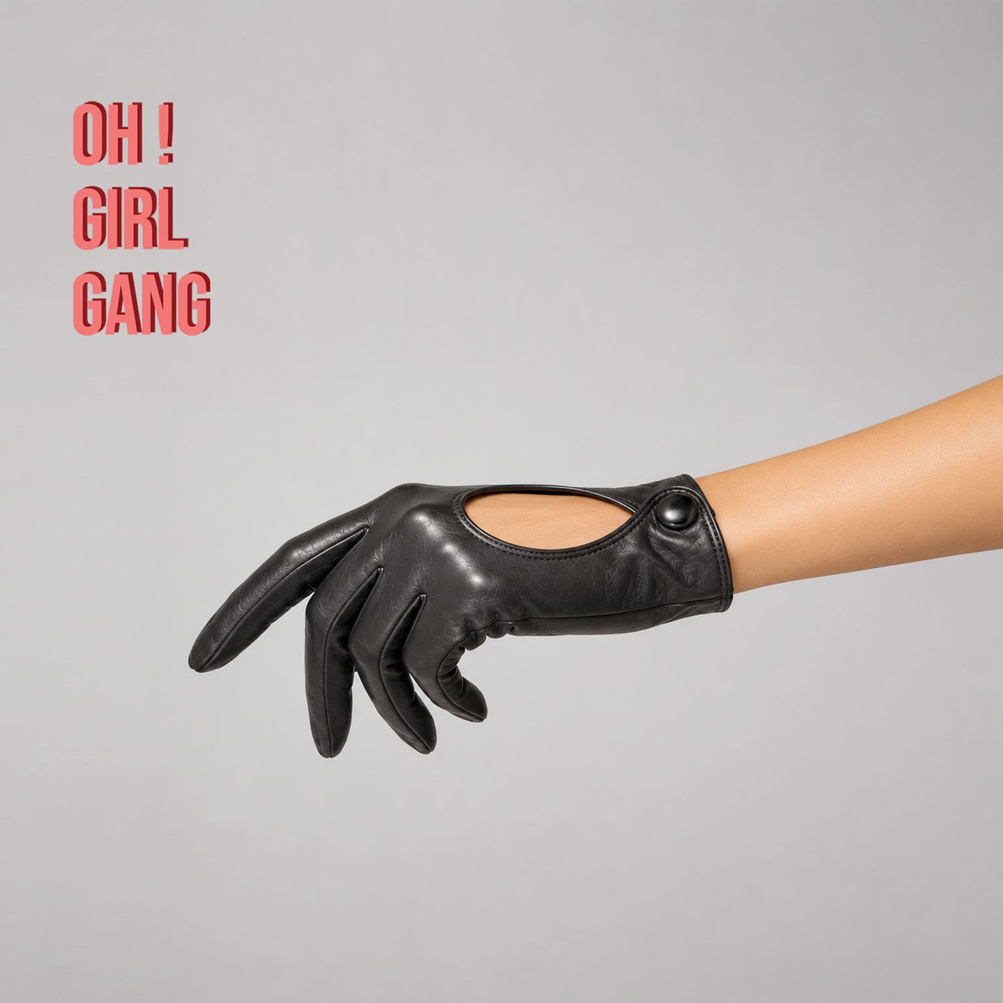 Pair of genuine leather driving gloves in burgundy, white, black, featuring an elegant open-back teardrop cutout with snap-button closure. Soft premium leather with a classic vintage-inspired design, displayed on a light grey background.
