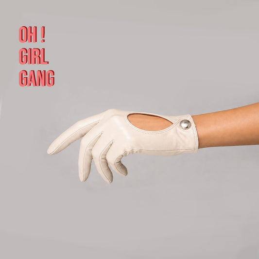Pair of genuine leather driving gloves in burgundy, white, black, featuring an elegant open-back teardrop cutout with snap-button closure. Soft premium leather with a classic vintage-inspired design, displayed on a light grey background.