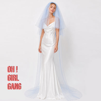 Soft, flowing, and effortlessly elegant, this cathedral veil adds beautiful movement to every step. Whether you choose classic ivory or a romantic pastel shade like lilac, light pink, or light blue, this veil is designed to make your bridal look truly unforgettable. 3 meter cathedral length 3 layers long veils