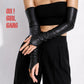 Sleek black fingerless long gloves made from genuine goat leather. Designed with a pointed hand shape and middle-finger loop, available in 30cm, 40cm, and 50cm lengths with sizes S–XXL. Finished with a thin lining for a smooth, comfortable fit.