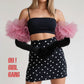 Ruffles pom pom gloves in pink